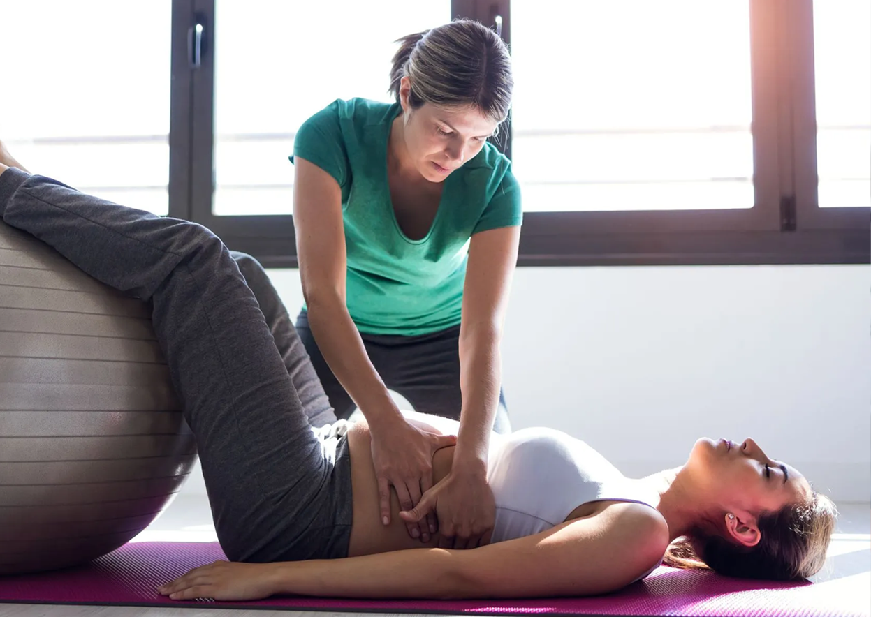 Female patient receiving pelvic floor physiotherapy treatment from a certified physiotherapist at Churchill Physiotherapy Clinic in Mississauga