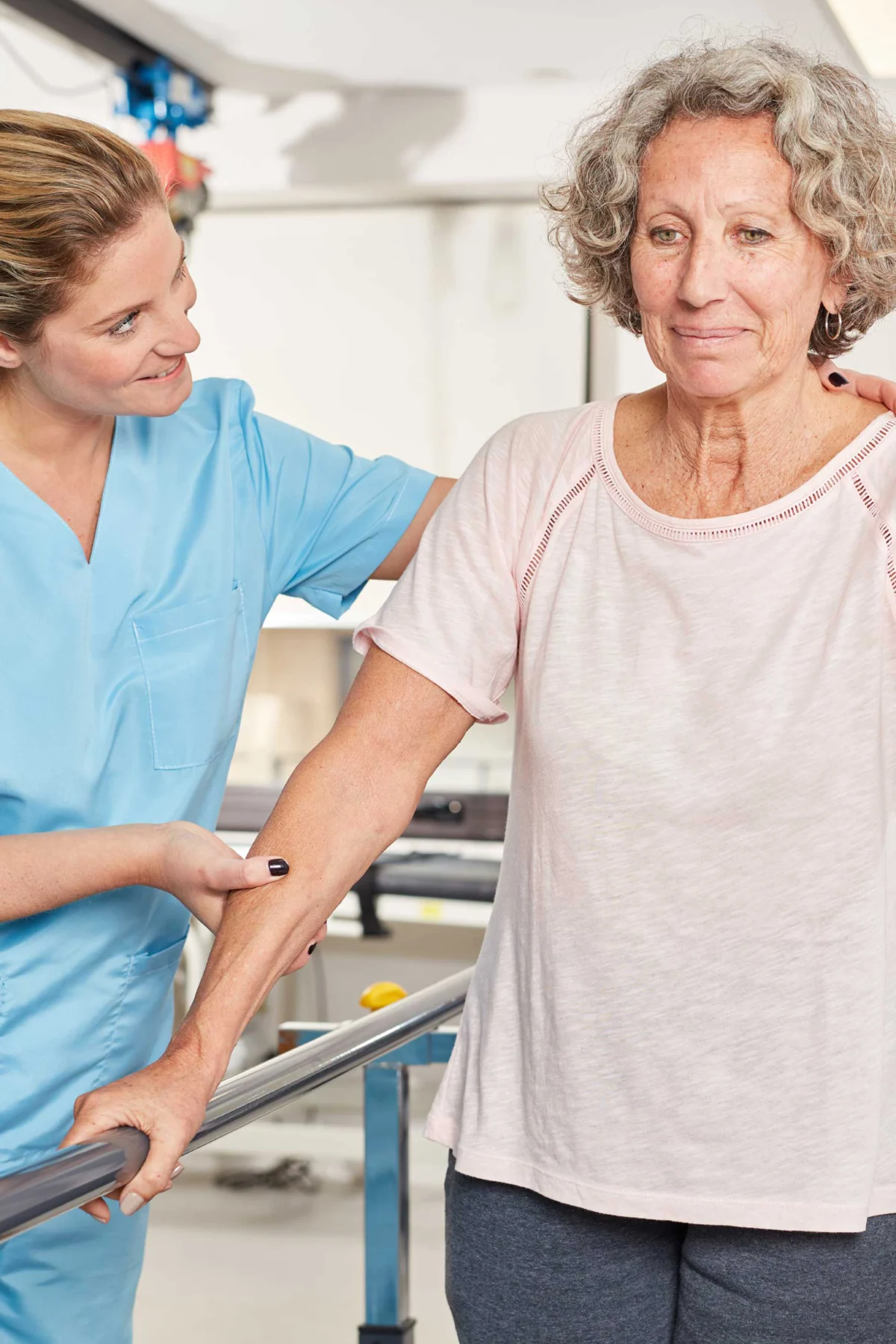 A physiotherapist assisting a patient