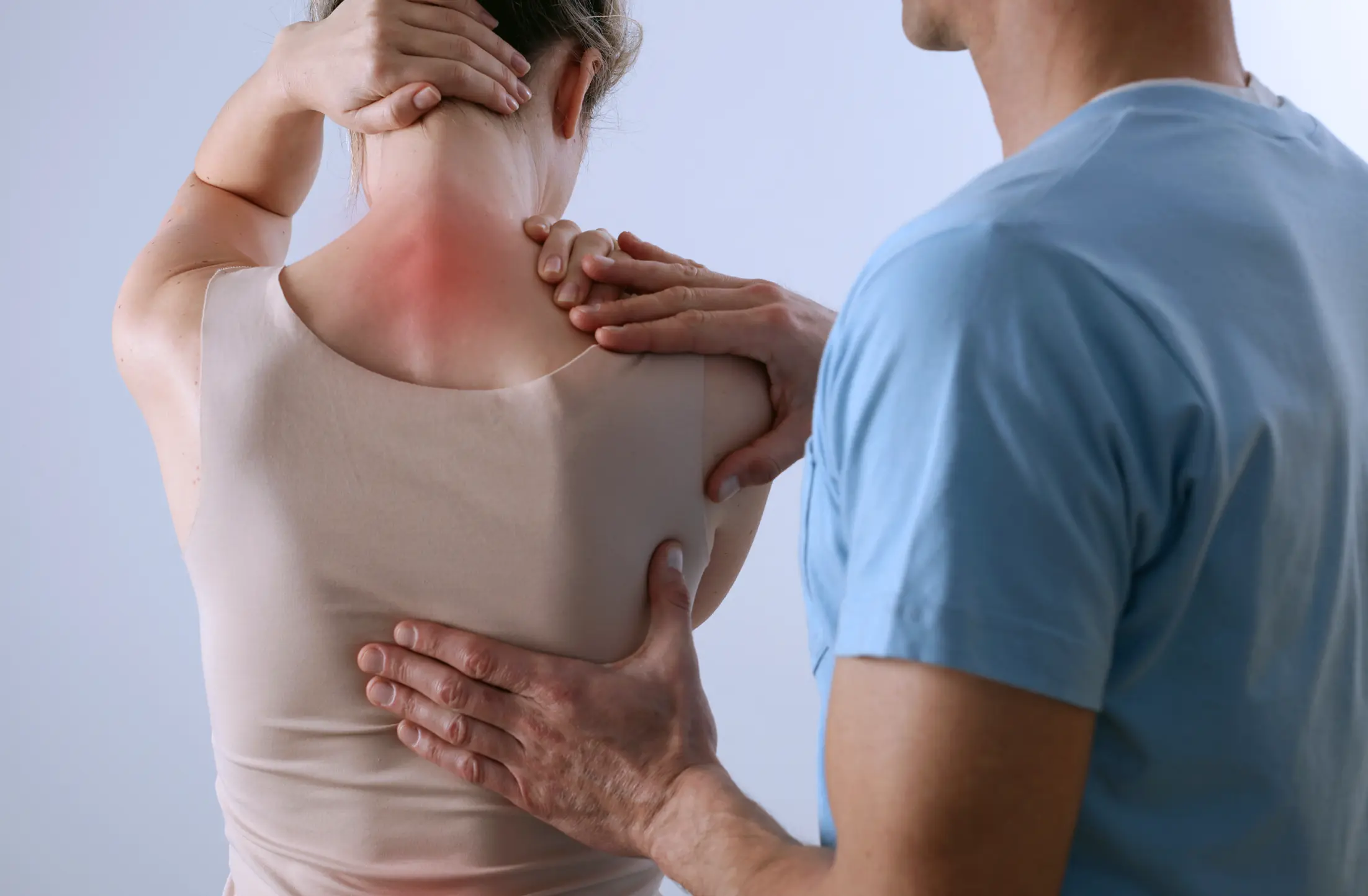 Physiotherapist assisting a patient